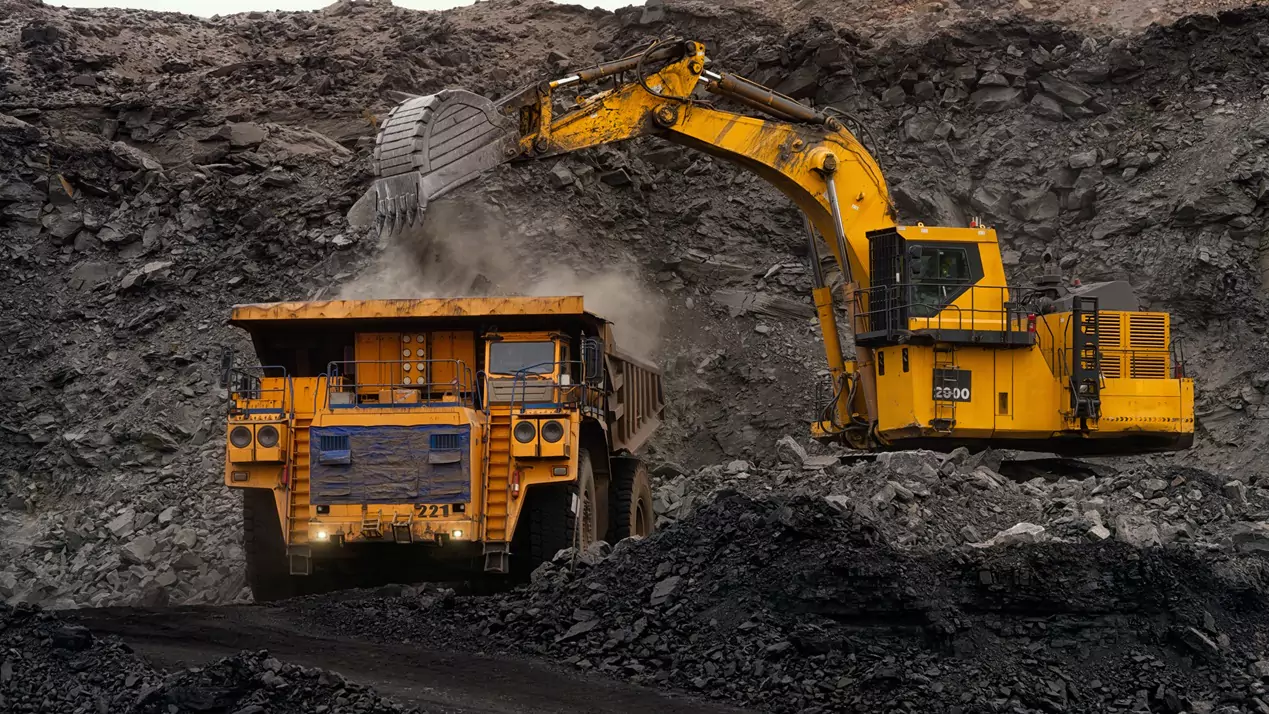 Huge excavator - heavy mining dump truck coal and rock 