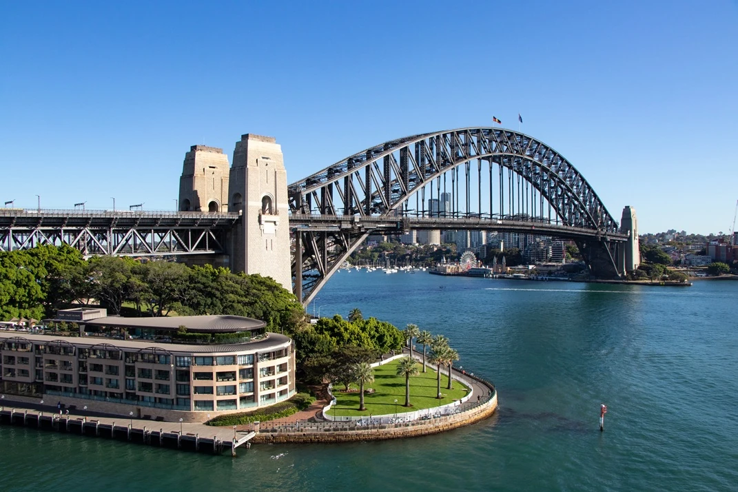 Sydney Harbour Bridge shown over the water; APEC offers non-destructive testing (NDT) services for structural and industrial assets across Sydney.